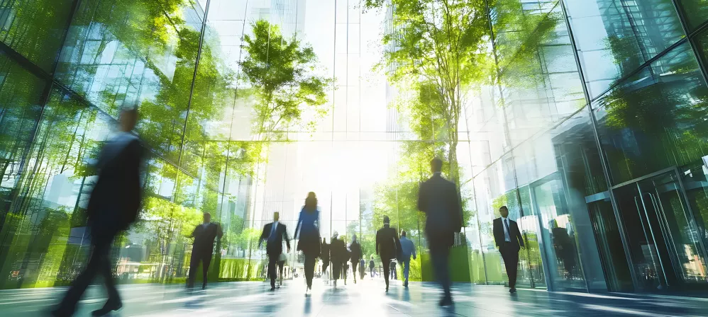 Sustainability office building with green trees and people