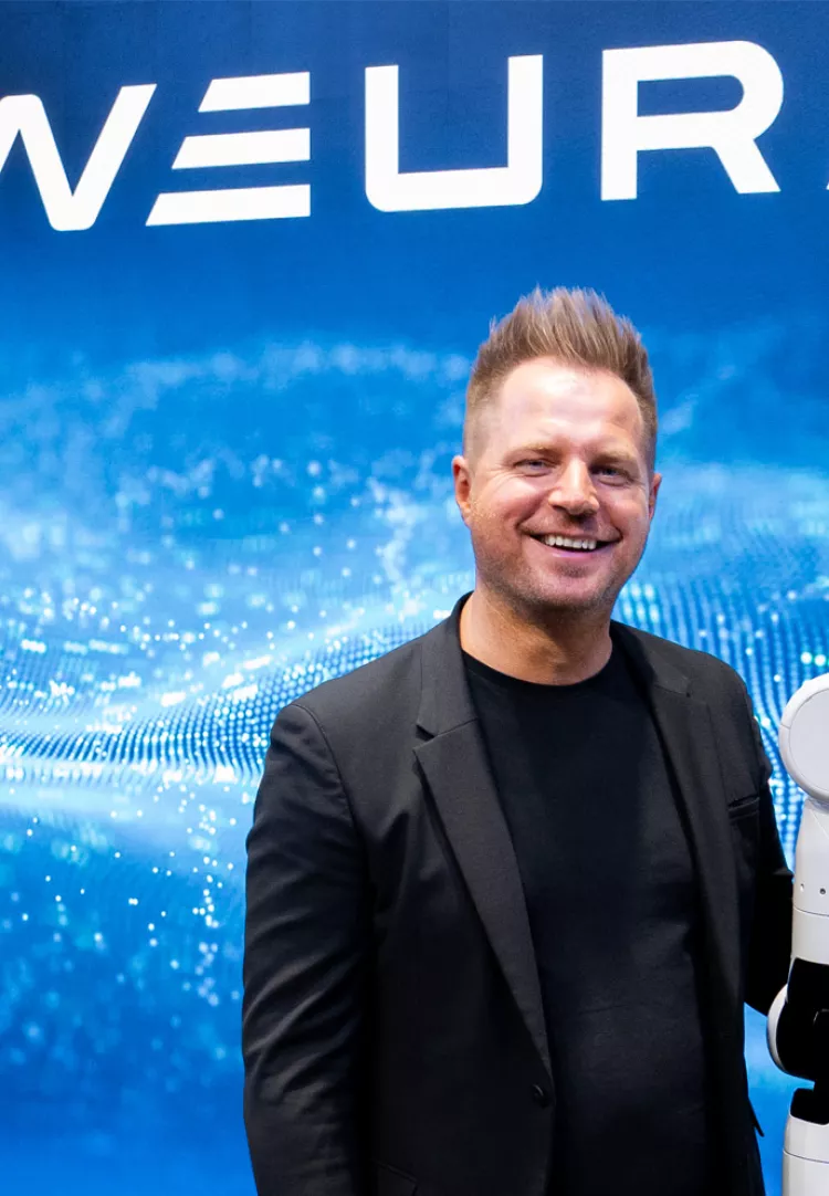 Neura Robotics CEO David Reger with Robot