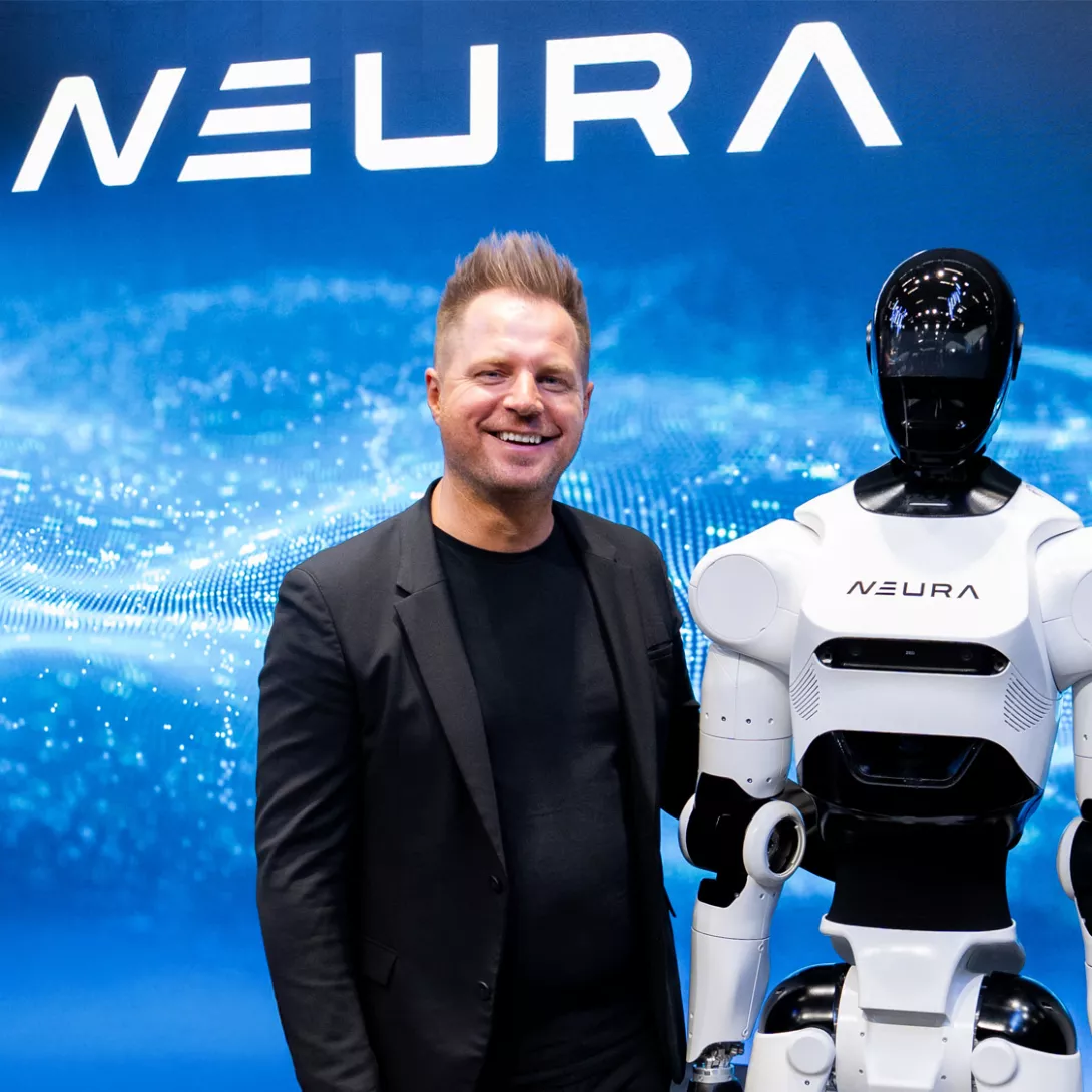 Neura Robotics CEO David Reger with Robot